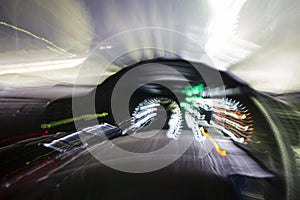 Blur motion inside car light trail represent moving car or drunk driver photo