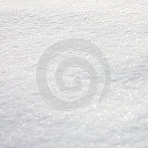 Blur Nature Winter background. Beautiful natural pattern on snow. View of the snow cover in Winter sunny day. Square Wallpaper or