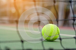 Blur net tennis on ball