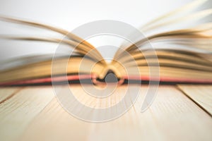 Blur open book with copy space in windy , Image for fly education and brightness concept