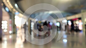 Blur of passenger moving in duty free shop