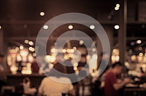 Blur of people in cafe,restaurant with lighting background photo