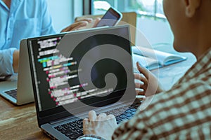 Blur soft focus group, Developer programming and coding technology smartphone and computer ,Website design Safety of the social
