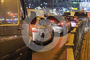 Blur of Traffic jam on the road in the city in evening light,abstract night light background with blurry shallow depth of focus