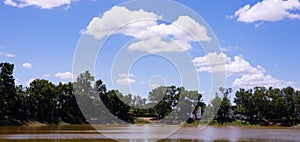 Blur of water glass set on wooden floor ,for background, on natural background.