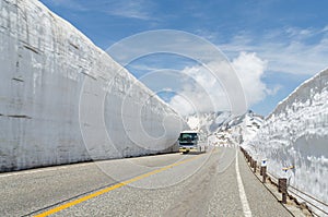 Blur windshield bus move along snow wall at tateyama kurobe alpine route