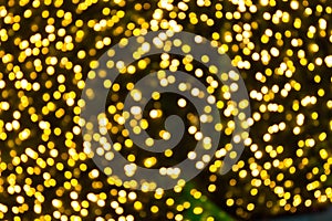 Blured gold color bokeh christmas background