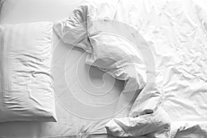 Blured messy bed. Concept of relaxation and rest time in morning. Black and white color theme