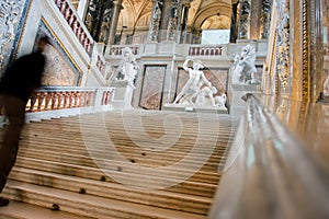 Blured motion of a rushing man on the staircase