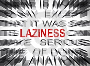 Blured text with focus on LAZINESS photo