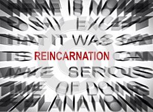 Blured text with focus on REINCARNATION photo