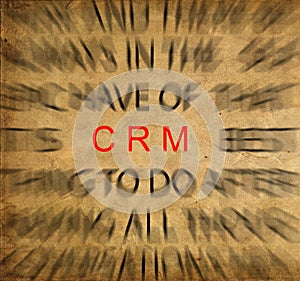 Blured text on vintage paper with focus on CRM (Customer Relationship Management)