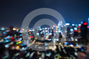 Blurred abstract background lights, beautiful cityscape view of Kuala lumpur city skyline at night in Malaysia