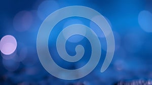 Blurred abstract image featuring bokeh effect with circular shapes of varying sizes