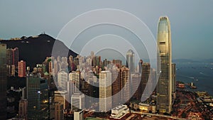 Blurred all visible brands and logos. Aerial view of Hong Kong city at early morning time.