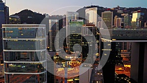 Blurred all visible brands and logos. Aerial view of Hong Kong city at early morning time.