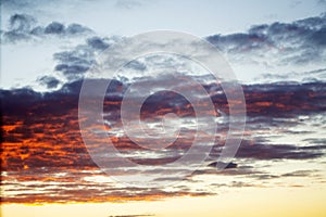 Blurred background. Blue sky and white fluffy clouds