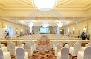 Blurred background of business seminar and conference event hall. Empty chairs at corporate meeting and presentation event in