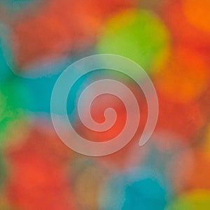 A blurred background of colorful out-of-focus lights, a blending overlay illustration in blue, orange and red