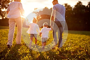 Blurred background of family in nature