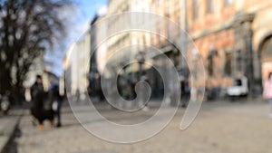 Blurred Background of many people on street square old ancient city