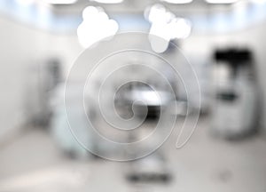 Blurred background of modern operating room at medical hospital interior with the anesthesiology machine equipment