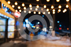 blurred background with multicolored bokeh in night city