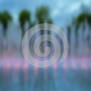 Blurred background photo with illuminated fountain