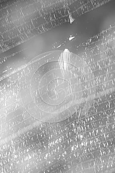 Blurred black plastic mesh