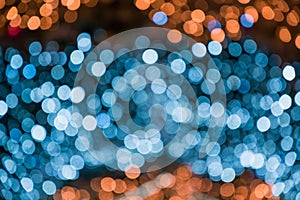 Blurred blue garland. City night light blur bokeh, defocused background. Christmas abstract