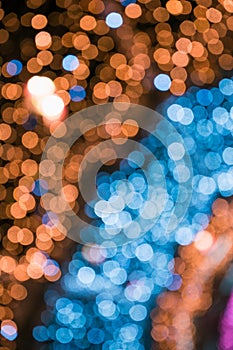 Blurred blue garland. City night light blur bokeh, defocused background. Christmas abstract