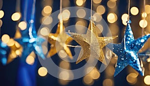 Blurred bokeh light background. New Year\'s decor in the shape of stars. New Year and Christmas background, bokeh, sparkles