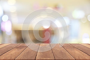 Blurred bokeh light background and Wooden table
