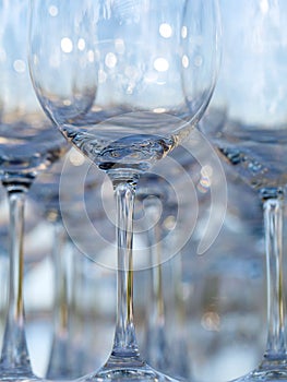 Blurred and bokeh of wine and champagne glass setting for wedding ceremony.