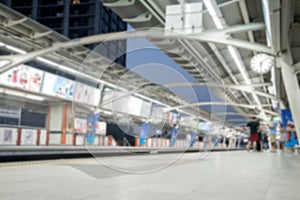 Blurred of BTS skytrain arrives to terminal station photo