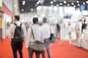 Blurred business people at a trade fair