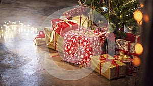 Blurred chrismas background with presents gifts lights photo