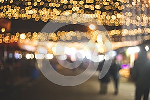 Blurred christmas market background in festive lights