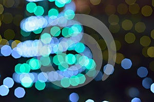 Blurred christmas tree lights in vertical frame