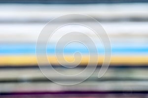 Blurred close-up of old vinyl LP records stack background