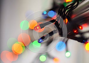 Blurred colored bright lights. Bokeh and art wallpaper concept. Christmas concept. Red, blue, green, orange lights.