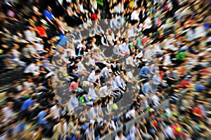 Blurred crowd of spectators on a stadium tribune