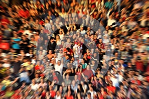 Blurred crowd of spectators on a stadium tribune