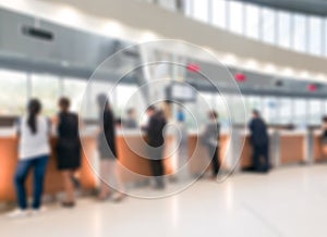 Blurred customer transaction in bank counter