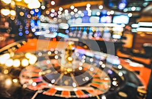 Blurred defocused background of roulette at casino saloon