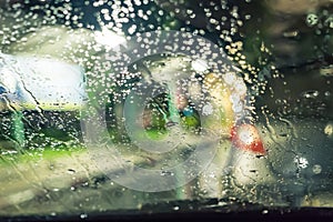 Blurred defocused rain windshield light
