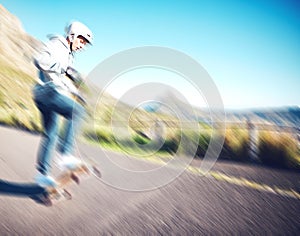 Blurred, fast and man skateboarding in the street for fitness, training and exercise in Brazil. Sport, speed and person