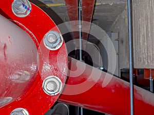 Blurred Fire pump system with big red pipe line system background