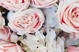 Blurred floral background with roses and hydrangeas