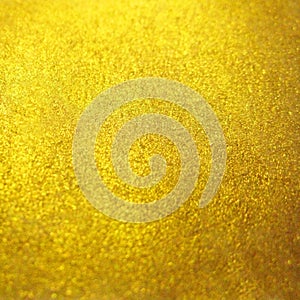 Blurred gold golden metal glitter surface background texture